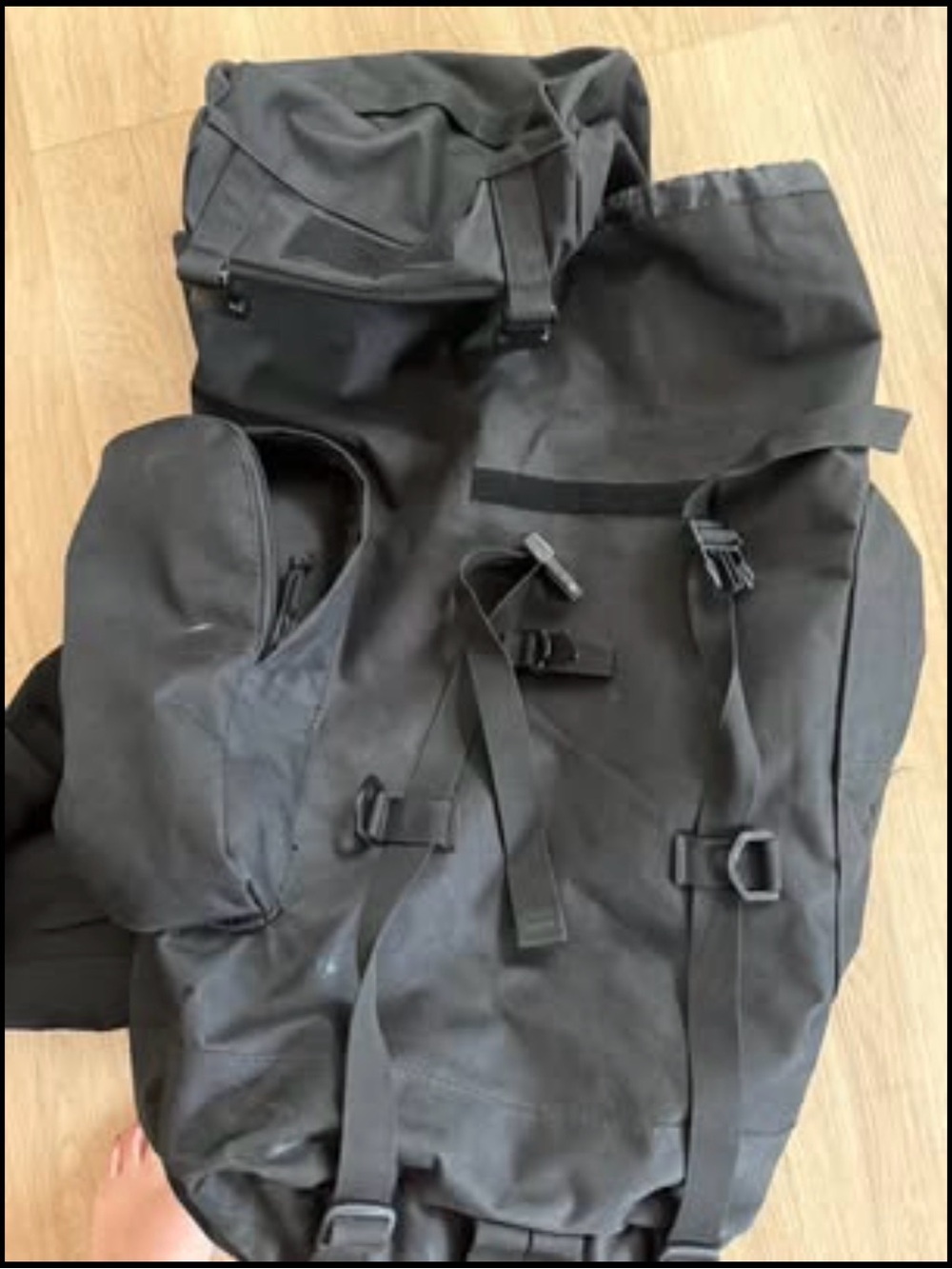 Large Black Utility Backpack with emergency waterproof blanket inside one pocket